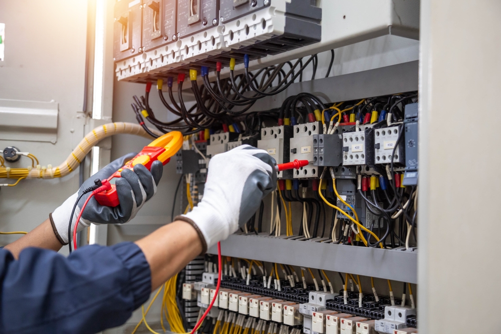 person upgrading an electric panel