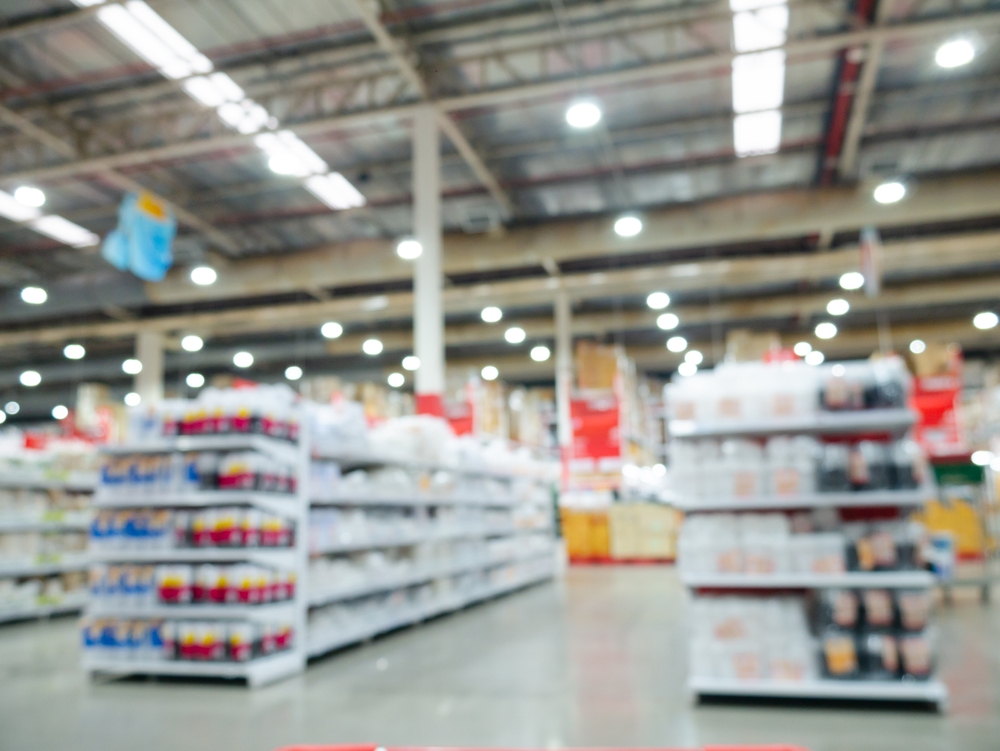 Blurred view of retail supermarket with aisles and products